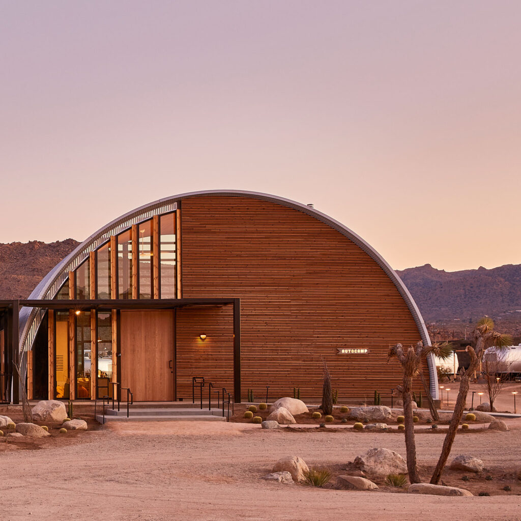 AutoCamp Joshua tree clubhouse front view at sunset